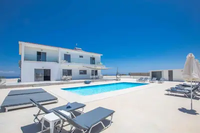 a villa with a swimming pool and a house at Villa Demeter GA98 in Paralimni