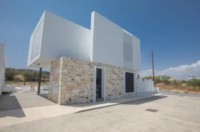 a church with two white steeples on a building at Protaras Elite Pearl Villa Ep17 in Protaras