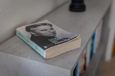 a book sitting on top of a shelf at Villa Mespila_ Ayia Napa in Ayia Napa