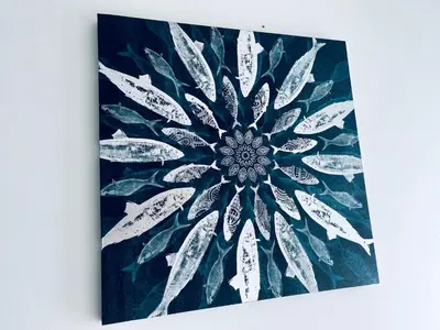 a black and white mandala painting on a canvas at The Blue House in Larnaka