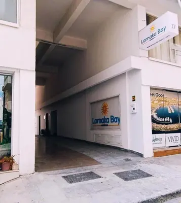 a store front with the entrance to a building at Palm Sea Suite 17 in Larnaka