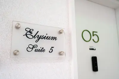 a sign on a door with the words asylum rule at Mythical Spa Suite - GYM*Yoga Room*Pools in Protaras